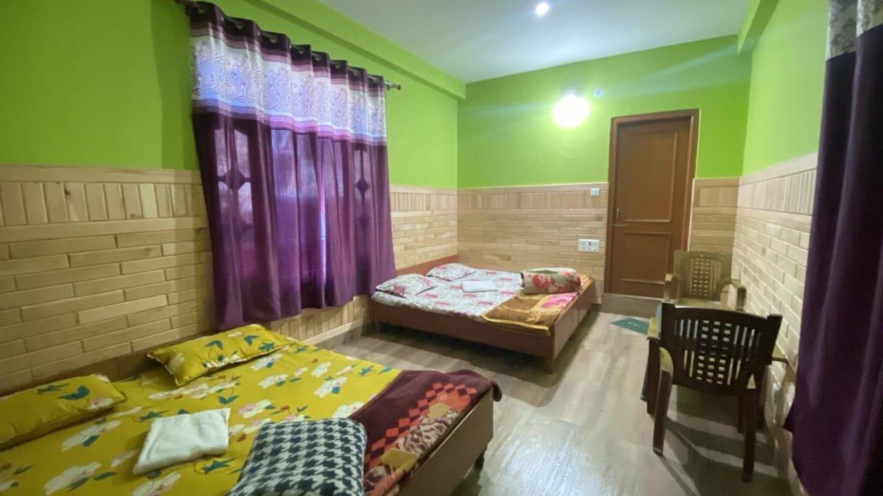 Nucleus Guest House Kasol Rum bild